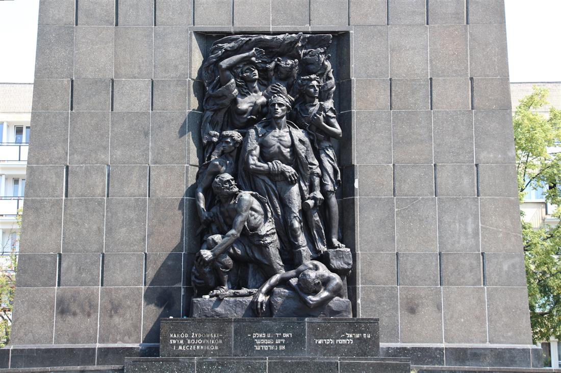 The bronze relief of the ghetto fighters on the Monument to the Ghetto Heroes in Warsaw.